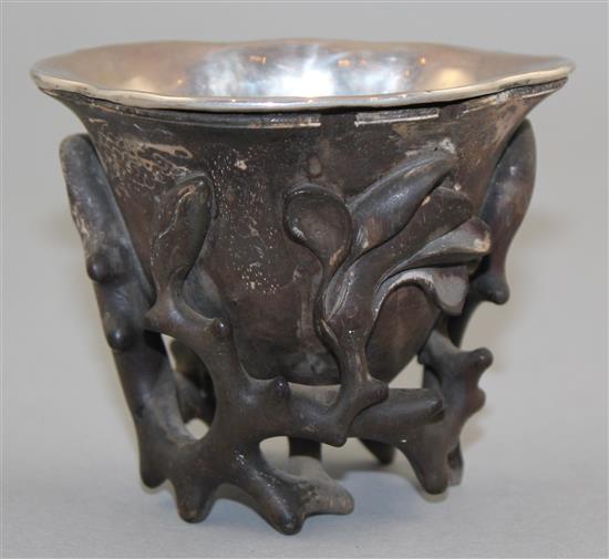 A Chinese rosewood libation cup, 17th / 18th century, 8cm, some losses and repair